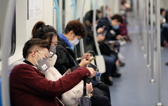 Chinese commuters wearing a mask amid the coronavirus outbreak