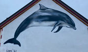 A Fungie mural was unveiled at the dolphin’s memorial service