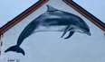 A Fungie mural was unveiled at the dolphin’s memorial service