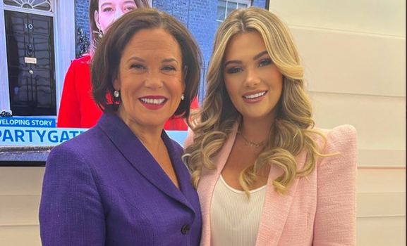 Mary Lou McDonald and Shaughna Phillips standing side by side smiling for a photo