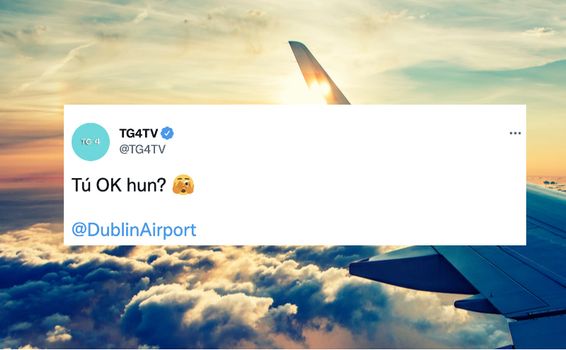 screenshot of tweet from TG4 which reads "Tú ok hun?" with Dublin Airport tagged below. Stock image of a plane in the sky in the background