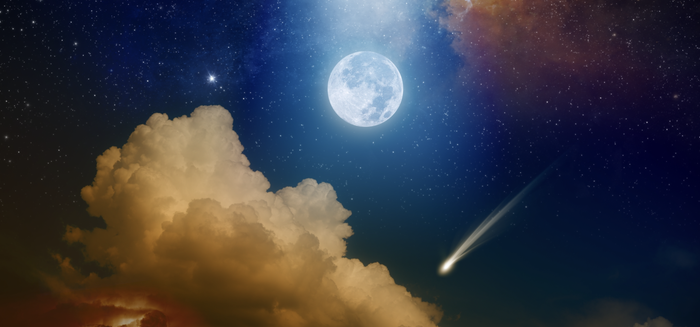 a supermoon, shooting star and clouds in a night sky