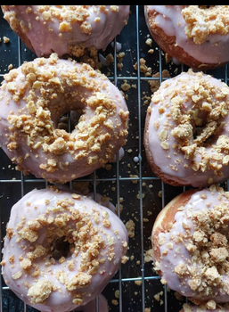 six donuts on a wire rack