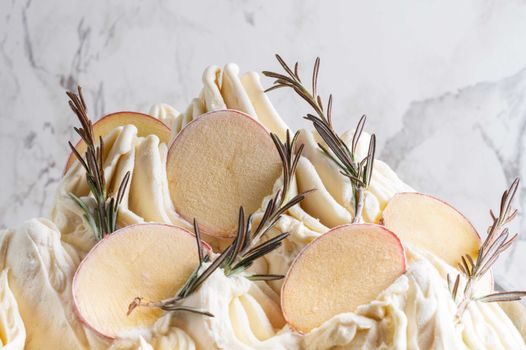 potato ice cream, topped with rosemary sprigs and thinly sliced spuds