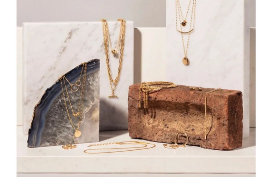 assortment of gold necklaces, earrings and other gold jewellery