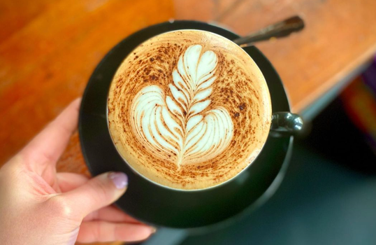milky coffee with latte art from Shoe Lane cafe