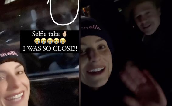 woman smiling for a selfie with brad pitt