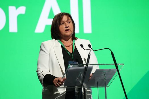 government td anne rabbitte speaking on a stage