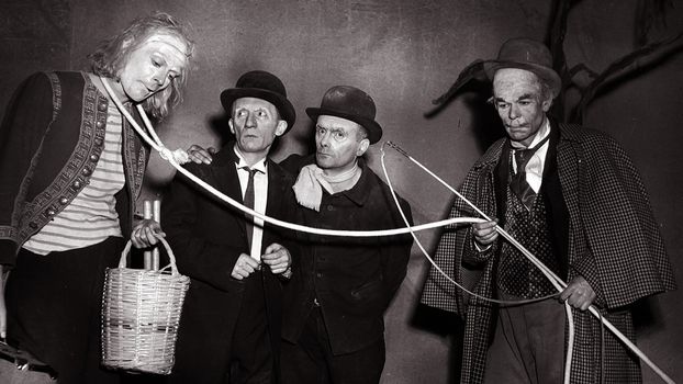 a black and white production photo of waiting for godot
