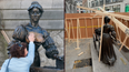 Molly Malone statue boarded up amid controversial touching debate